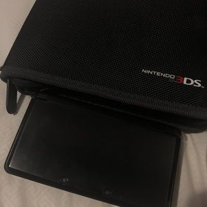 nintendo 3ds with case and choice of two games